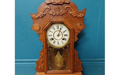 Early 20th C. oak gingerbread clock. {60 cm H x 37 cm W x 14...
