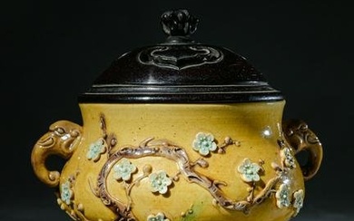 Elephant Ear Stove with Plum Pattern and Yellow Glaze Pile Plastic