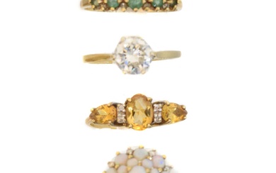 Four gold gem set dress rings