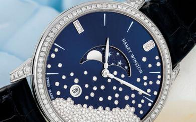 HARRY WINSTON. AN 18K WHITE GOLD AND DIAMOND-SET WRISTWATCH WITH MOON PHASES AND DATE