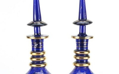 Pair of blue glass decanters made for the Islamic
