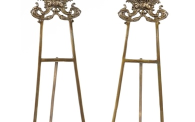 Pair of large Rococo style brass easel stands, 58cm high