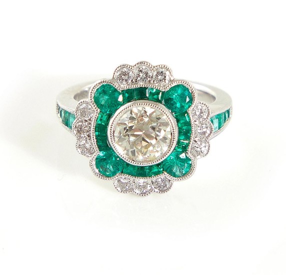 Platinum, diamond and emerald ring
