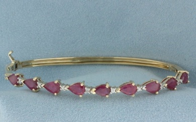 Ruby and Diamond Hinged Bangle Bracelet in 14k Yellow Gold