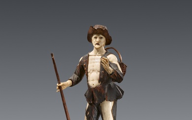 Simon Troger, attributed to - A carved ivory figure of a travelling peddlar, attributed to Simon Troger