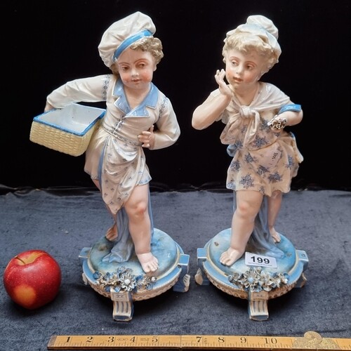 Star Lot : Two rare Charles Levy porcelain figures of cherub...