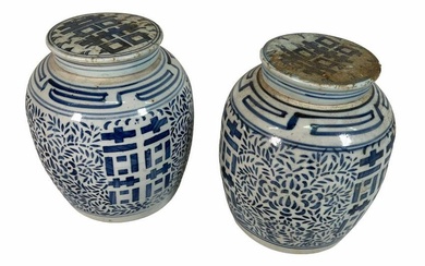 TWO ANTIQUE BLUE AND WHITE JARS WITH LIDS