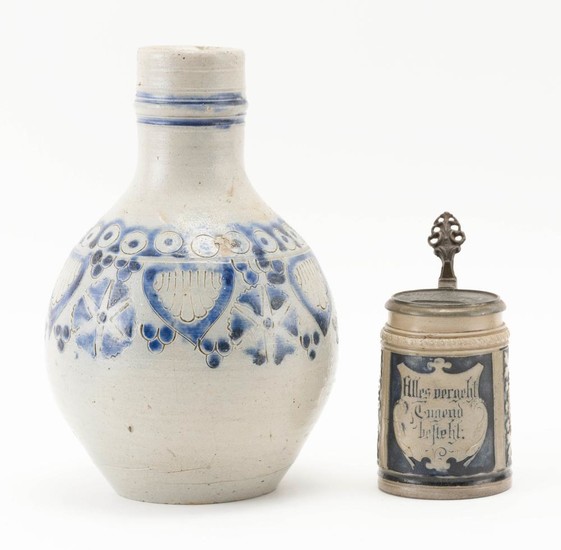 TWO PIECES OF GERMAN SALT-GLAZED STONEWARE 1) Jug, probably Westerwald. Incised and with cobalt blue decoration of a repeating shiel...