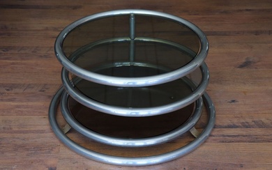 Table basse circulaire à monture tubulaire