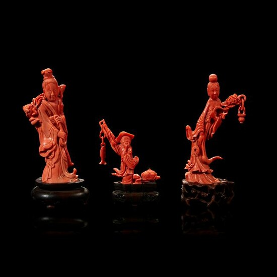 Three Chinese carved coral figural groups
