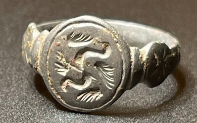 Viking Era Bronze Intact Seal-Ring with a stylised image of a winged dragon Fafnir. With an Austrian Export License.