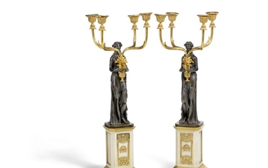 Vulliamy & son, attributed: A pair of Regency gilt bronze and white marble candelabra. England, c. 1800. H. 55 cm. (2)